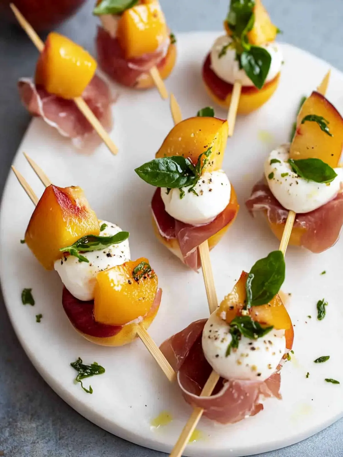 Mozzarella, Prosciutto, and Pickled Peach Appetizer Skewers