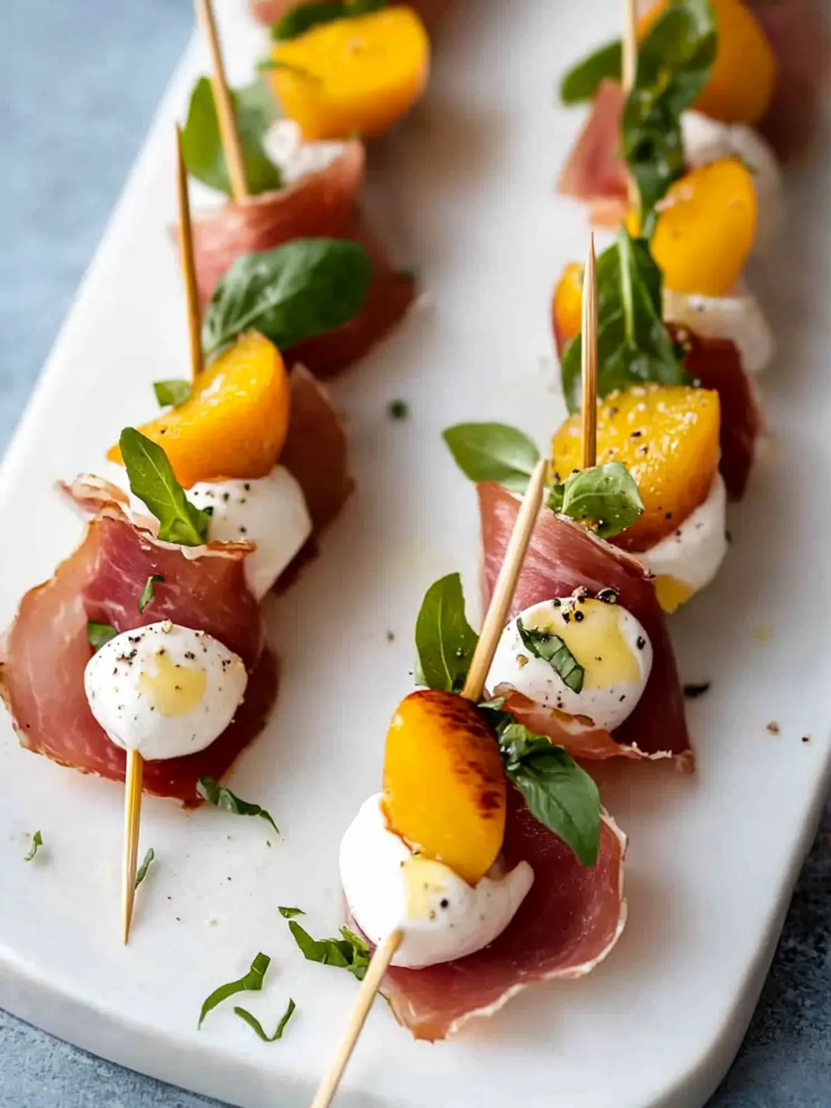 Mozzarella, Prosciutto, and Pickled Peach Appetizer Skewers